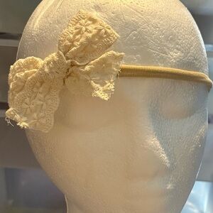 Elegant Cream Headband with Floral Bow